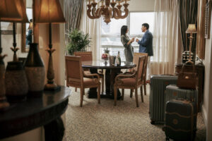 tbh-hotel-signal-hill-suite-couple-drinking-champagne-sus